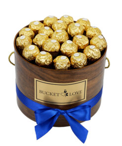 ferrero roche box of chocolate in a wodden brown box with blue bow